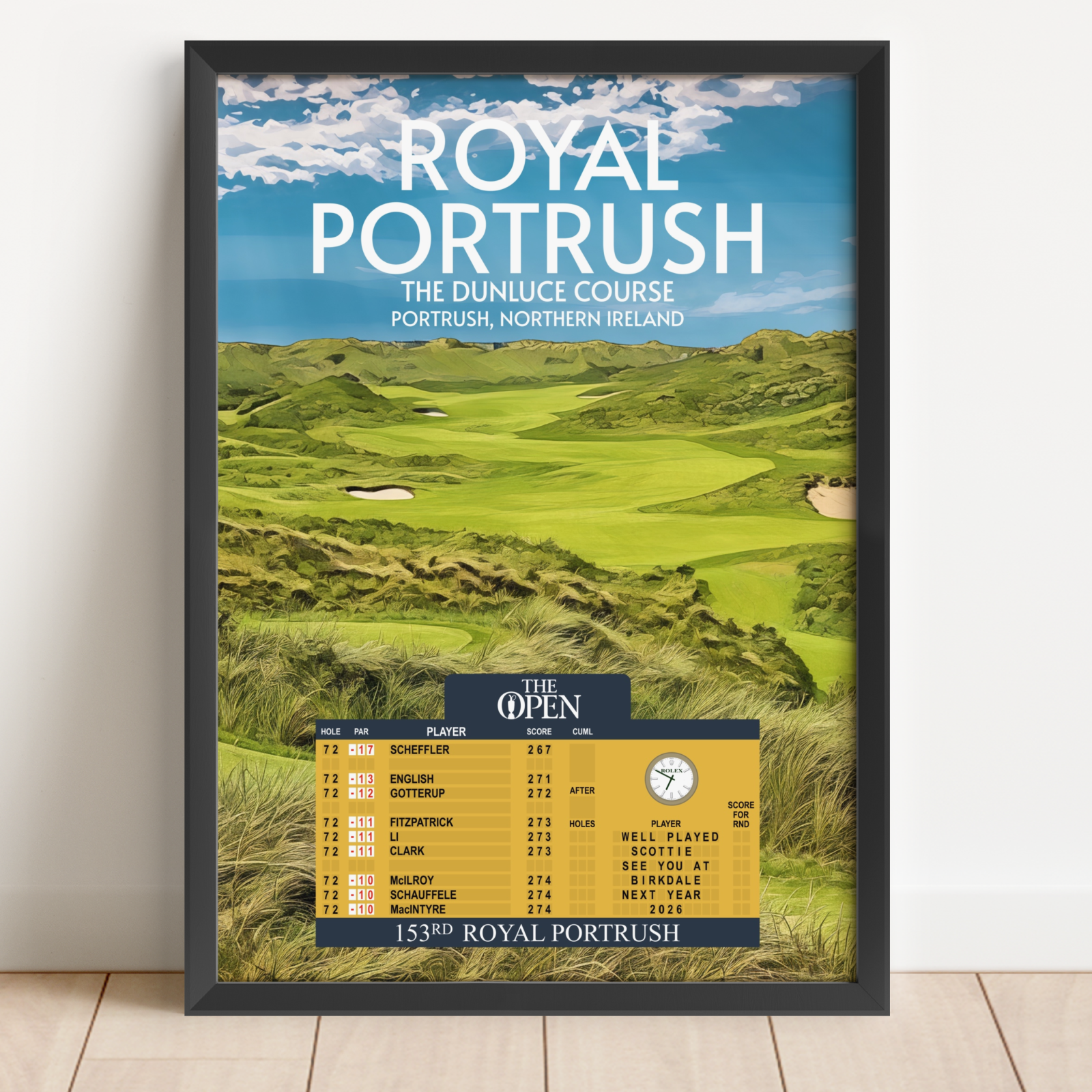 art print of royal portrush with the open 2025 leaderboard on it in a black frame on a white background