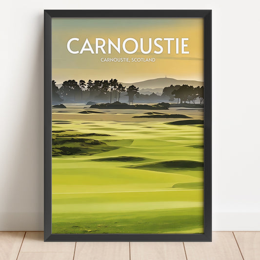 Framed poster of Carnoustie golf course with 'Carnoustie' text on a white wall.