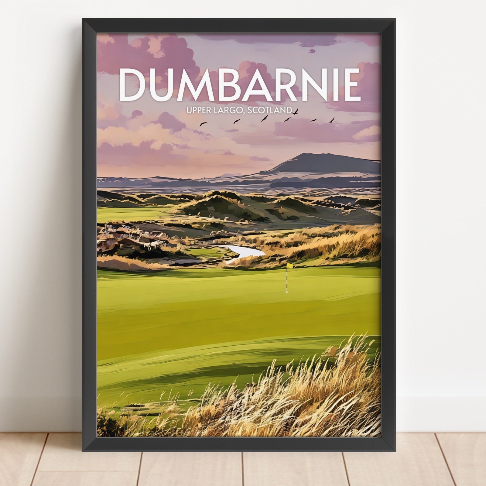 Framed artwork of a golf course with 'Dumbarnie' text on a white wall.