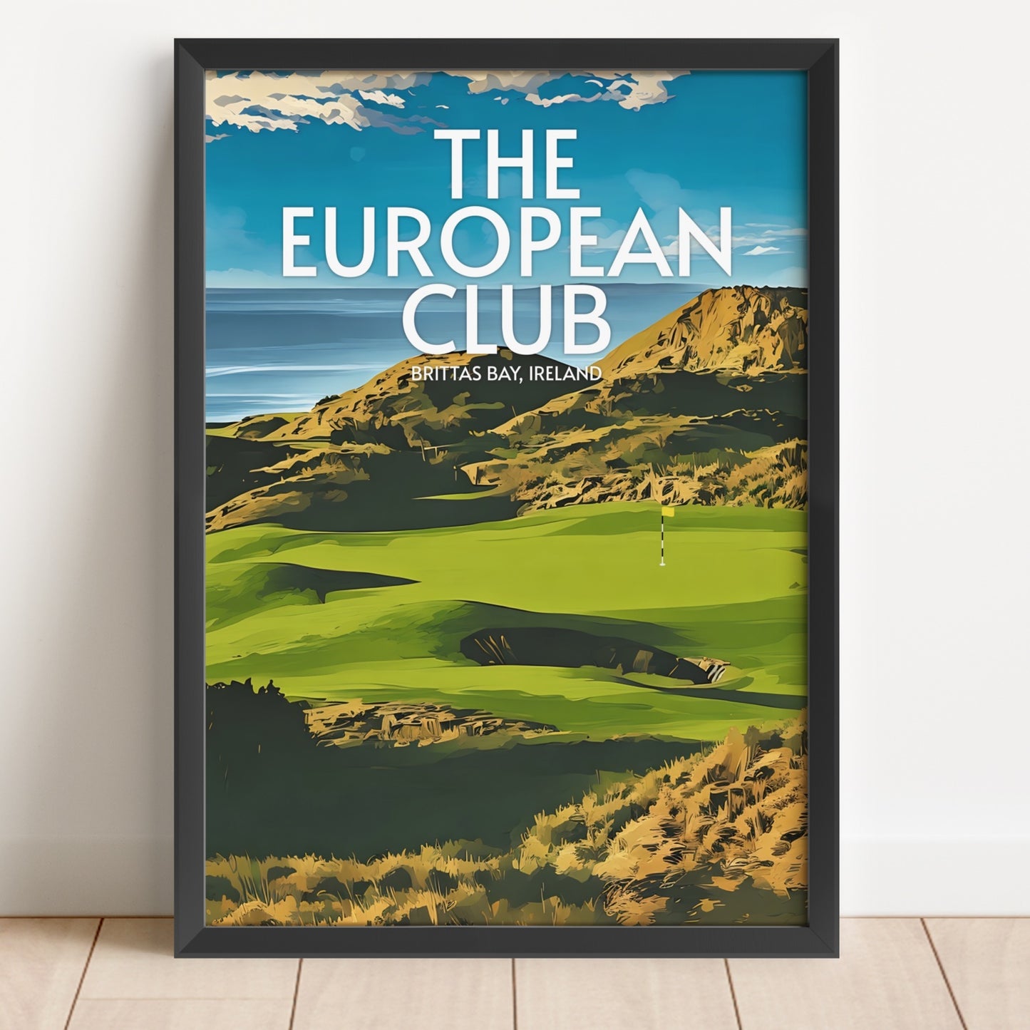 Framed poster of a golf course with 'The European Club' text on a white wall.