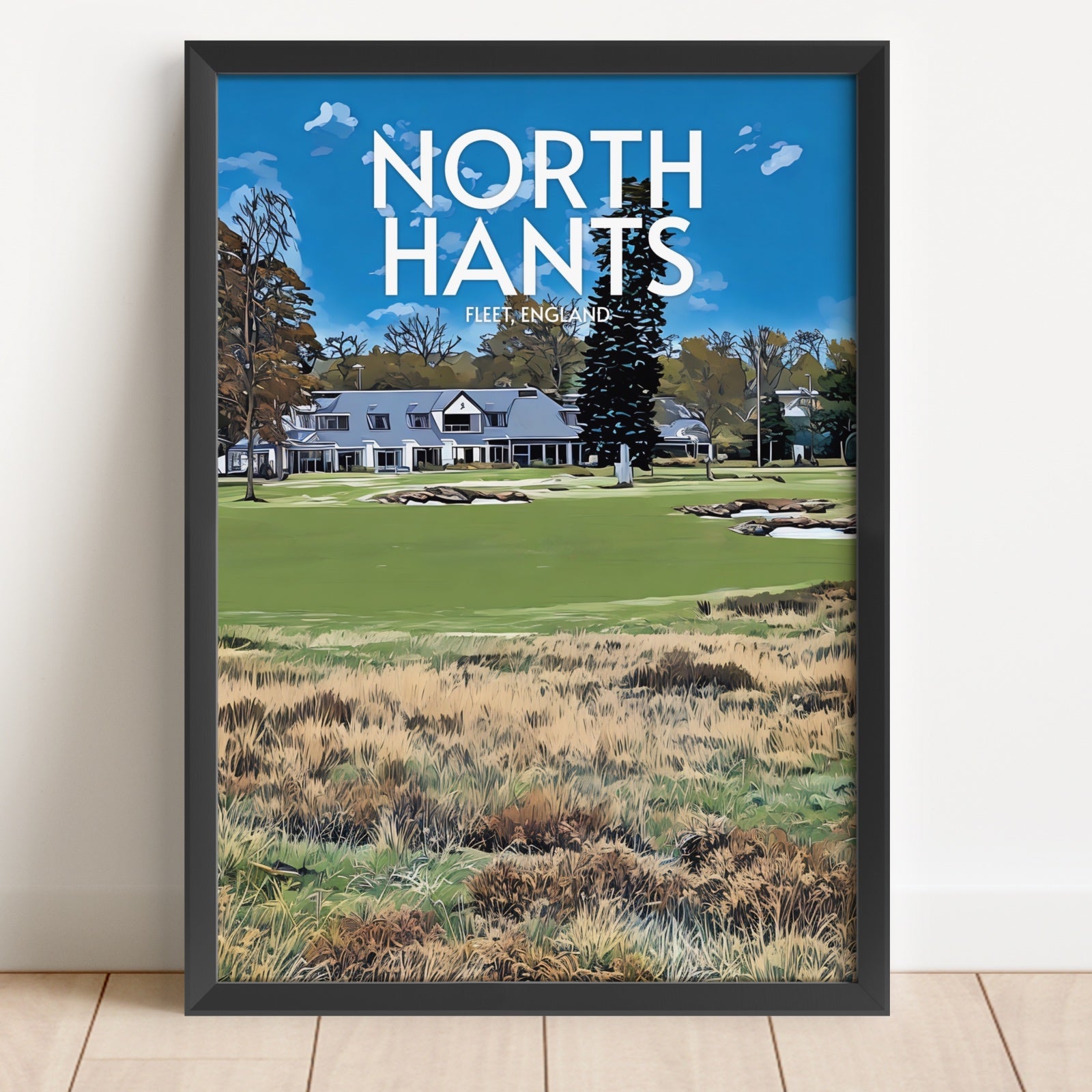 Framed print of a golf course with 'North Hants' text on a blue sky background