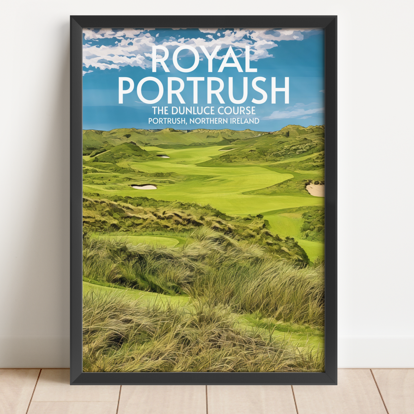 Art print of Royal Portrush golf course in a black frame on a white background