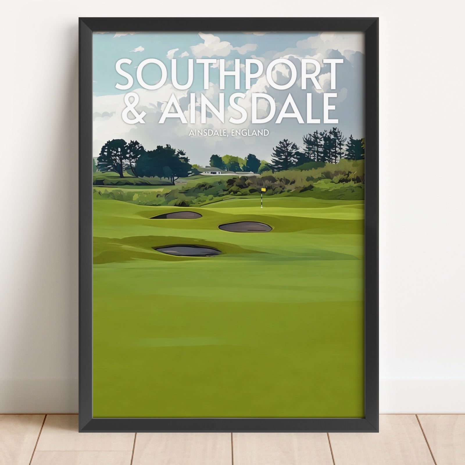 Framed poster of a golf course with 'Southport & Ainsdale' text on a white wall.