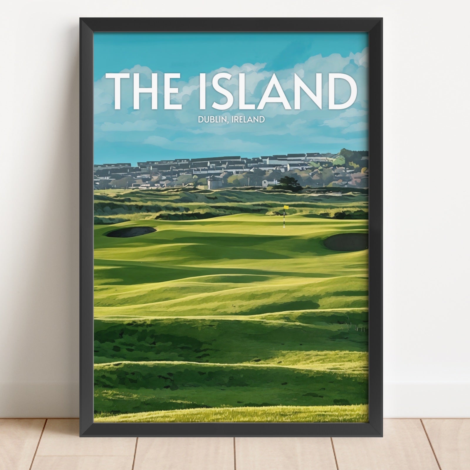 Framed poster of a golf course with 'The Island, Dublin, Ireland' text on a white wall.