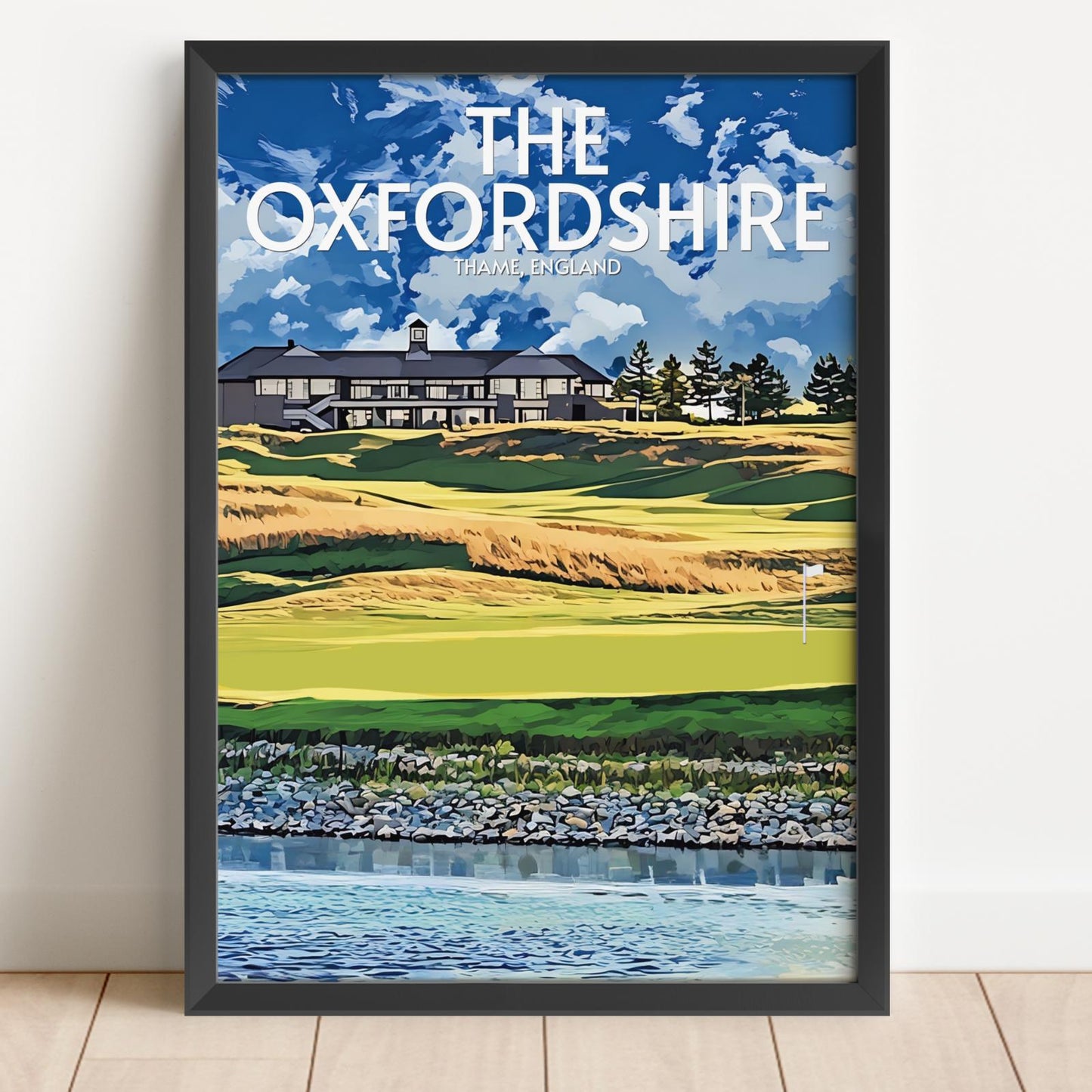Framed artwork of a golf course with 'The Oxfordshire' text on a blue sky background.