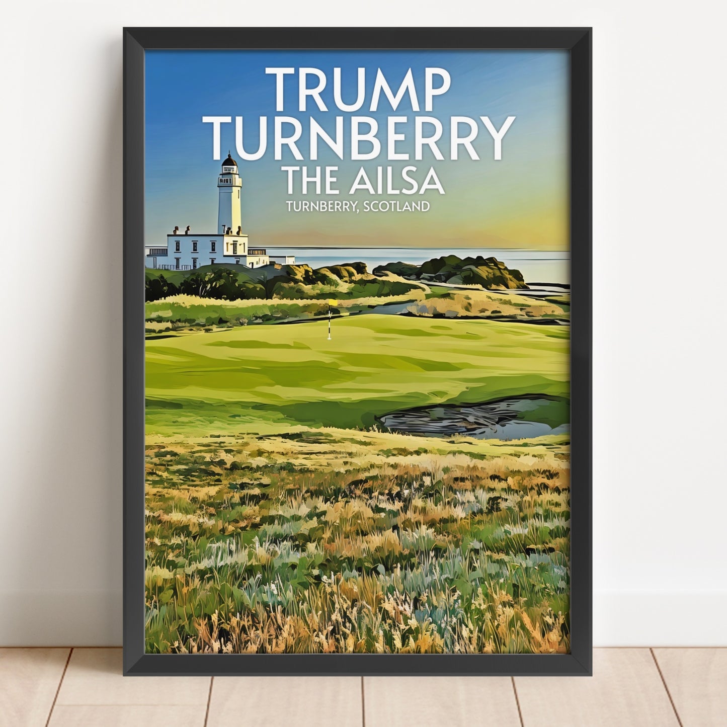Framed poster of Trump Turnberry The Ailsa golf course with a lighthouse in the background.